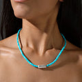 Howlite King turquoise necklace worn on model