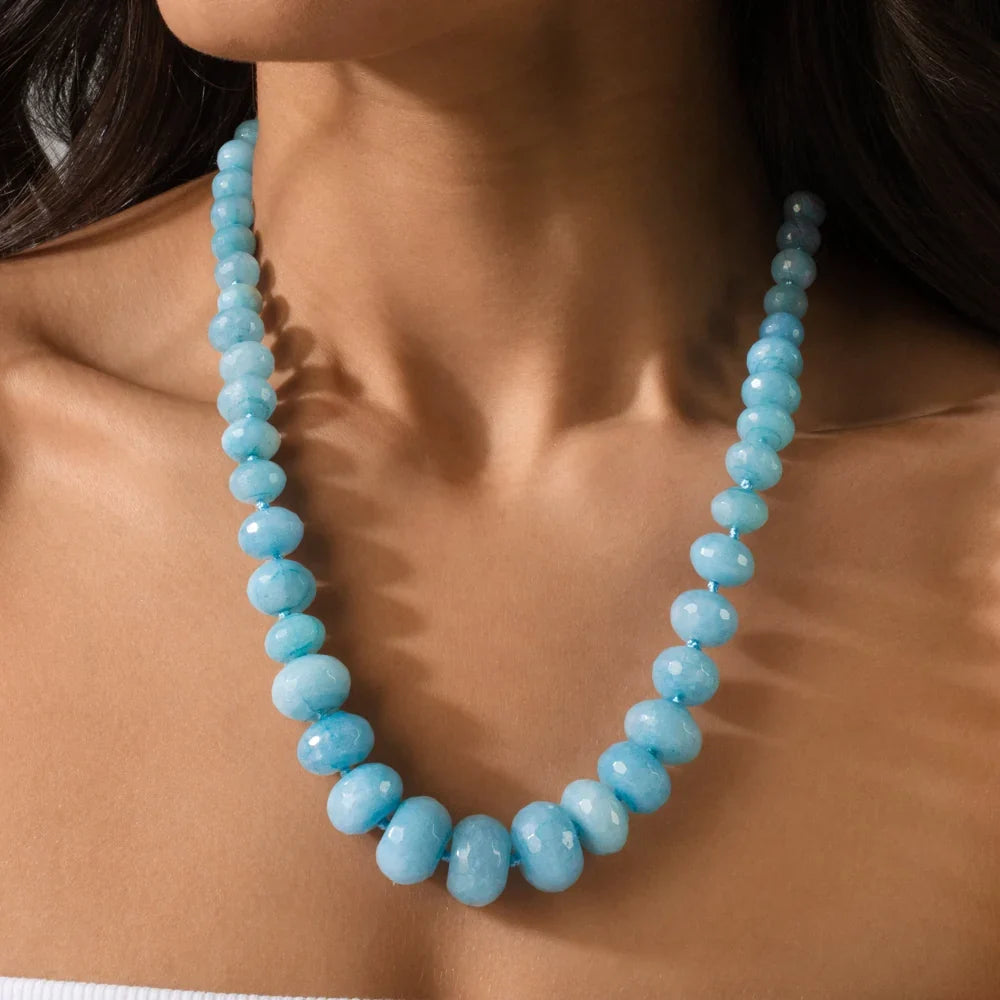 aquamarine graduated gemstone necklace worn on model