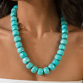 turquoise roundel necklace worn on model