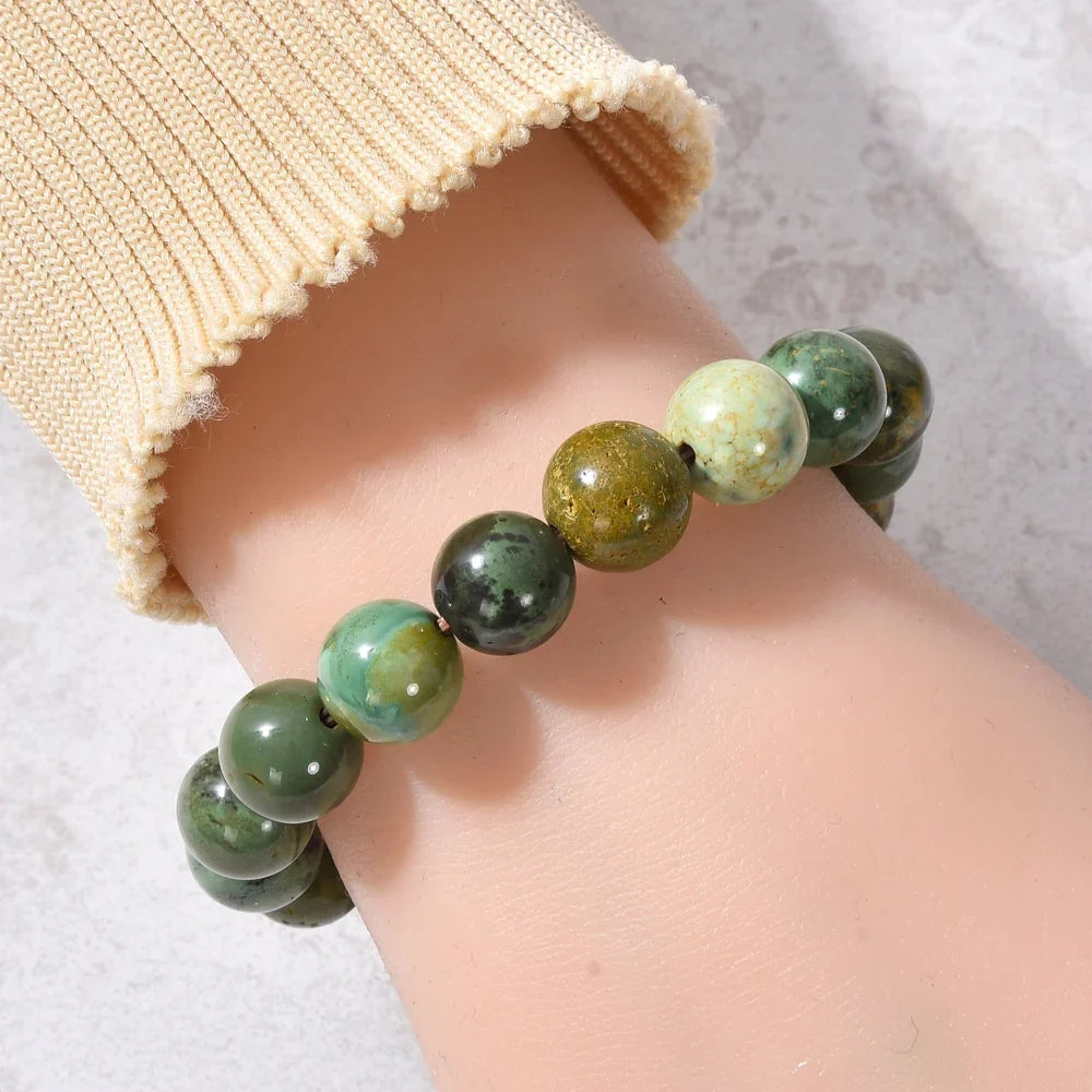 Mongolian turquoise 10mm elastic bracelet worn on wrist