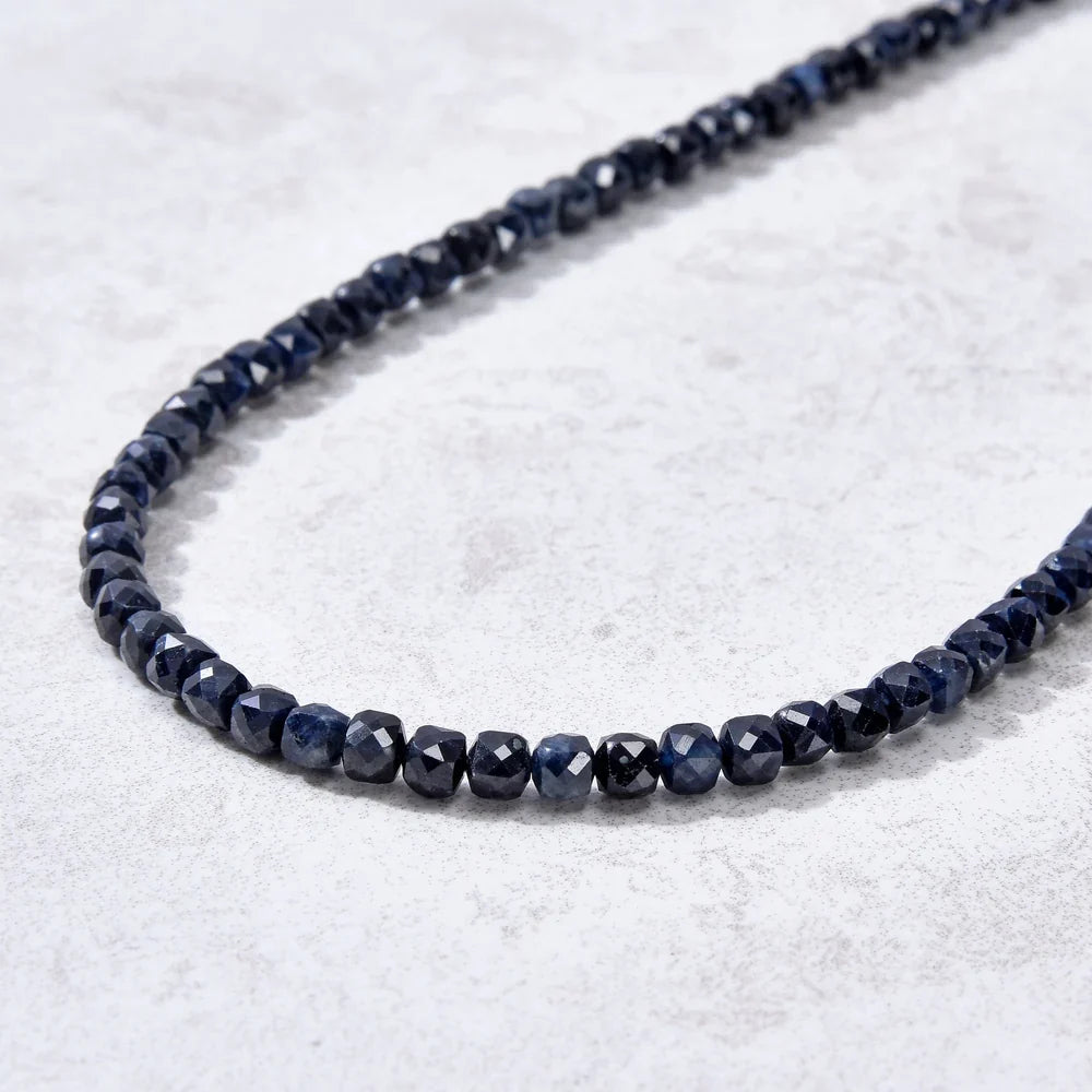 dark sapphire 4mm faceted cube gemstone detail