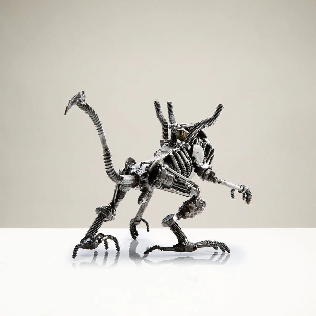 Alien Crouched Inspired Recycled Metal Sculpture
