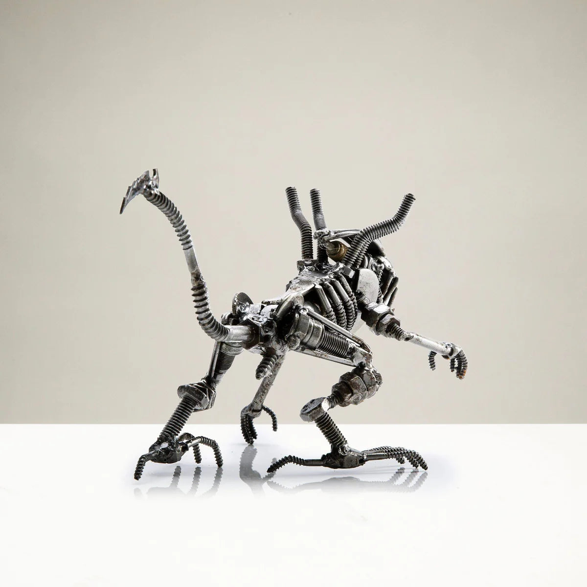 Alien Crouched Inspired Recycled Metal Sculpture