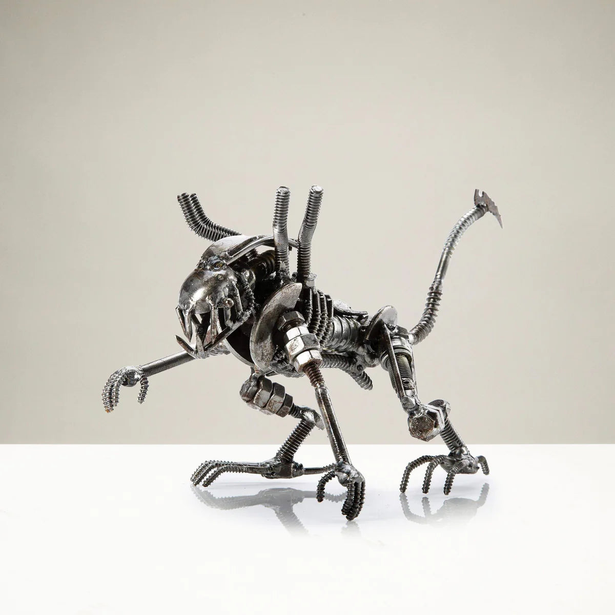 Alien Crouched Inspired Recycled Metal Sculpture